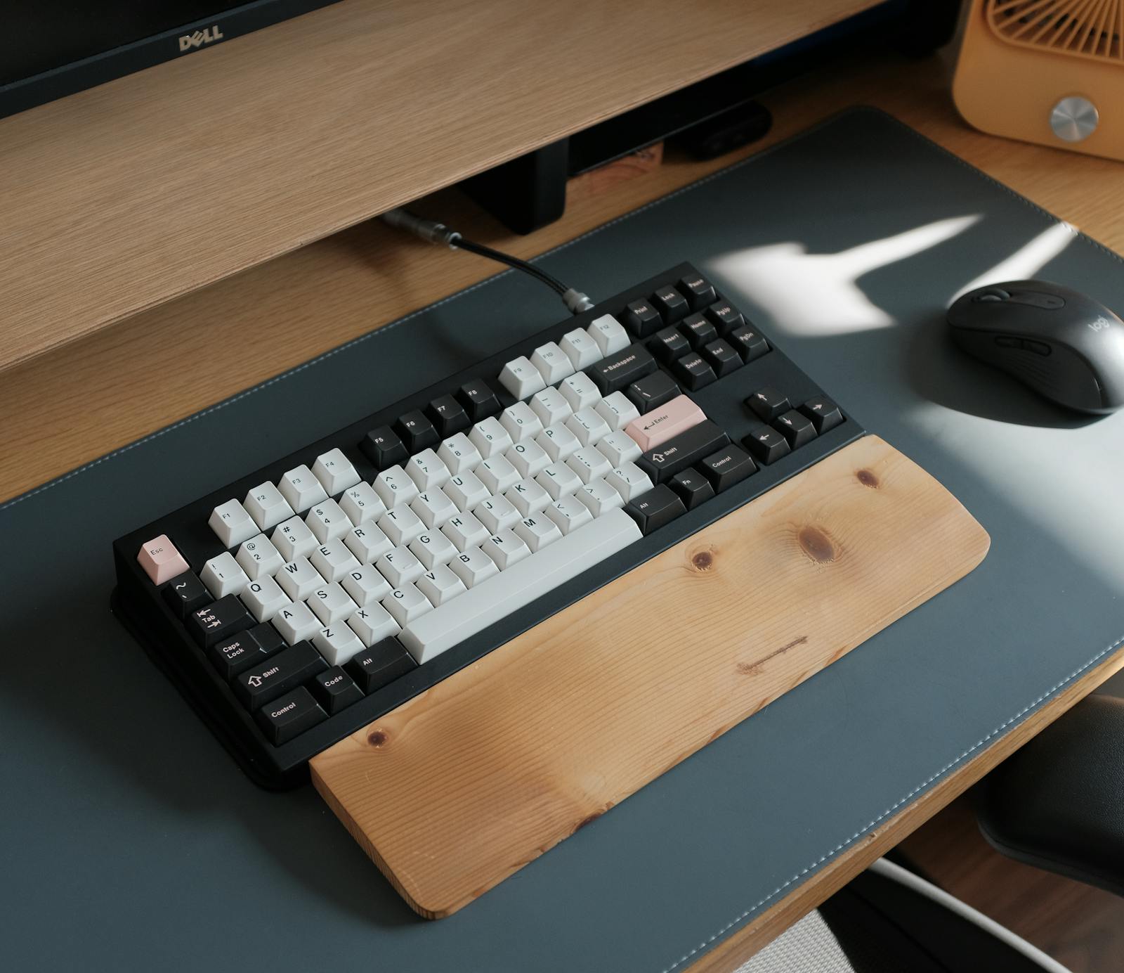 Walnut housing of keyboard.