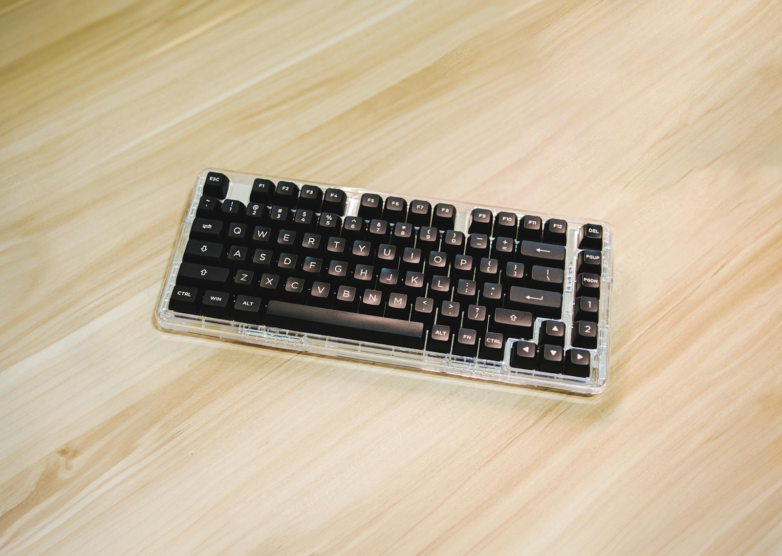 Compact mechanical keyboard with custom keycaps.