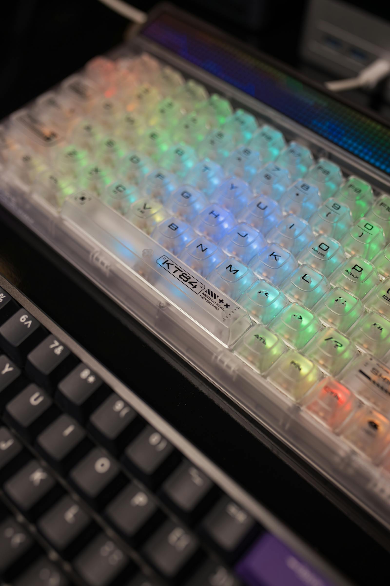 Hands typing on a custom keyboard.