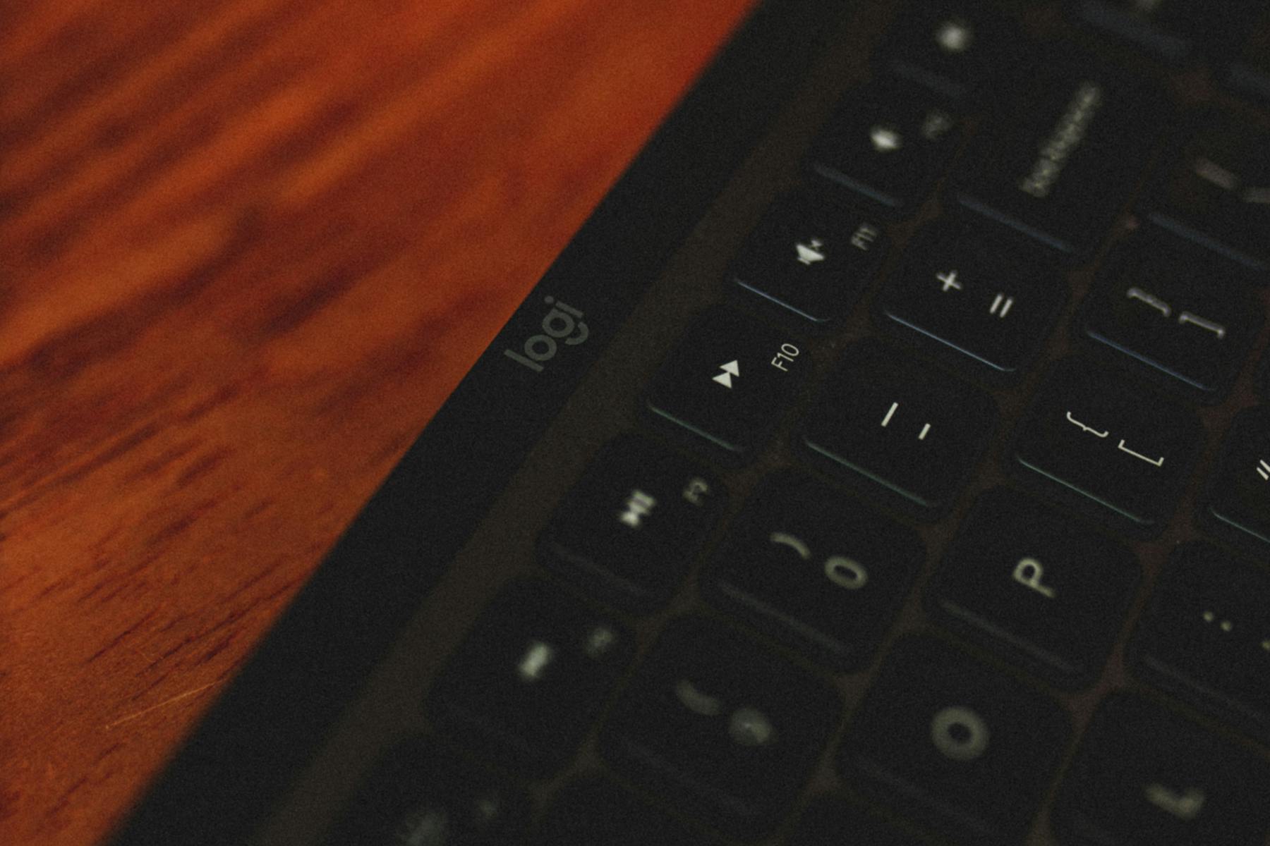 Hands typing on a keyboard.